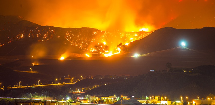 Santa Clarita wildfire in California 2019 in the hills above town.